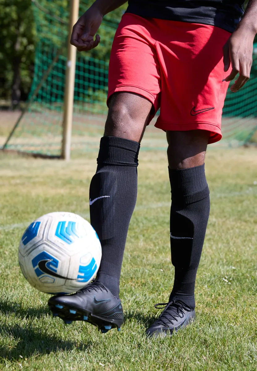 ACADEMY SHORT - Kurze Sporthose - university red/black