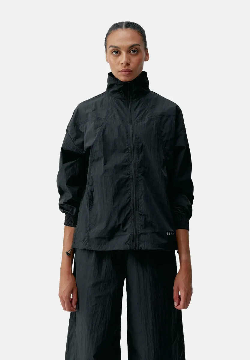 AMARA - Trainingsjacke - black
