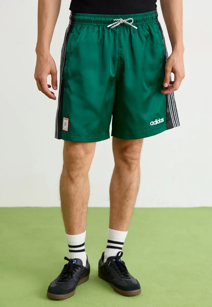 ARCHIVE  - Jogginghose - collegiate green/black