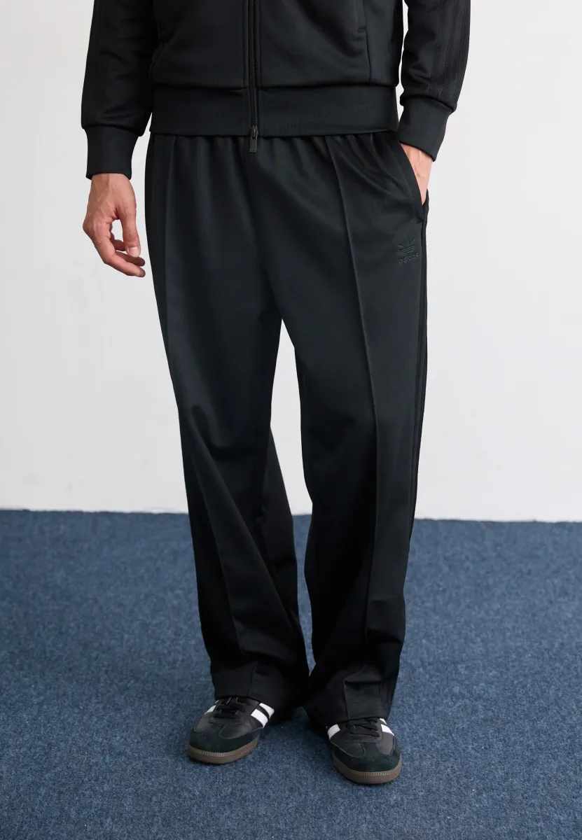 BAGGY - Jogginghose - black