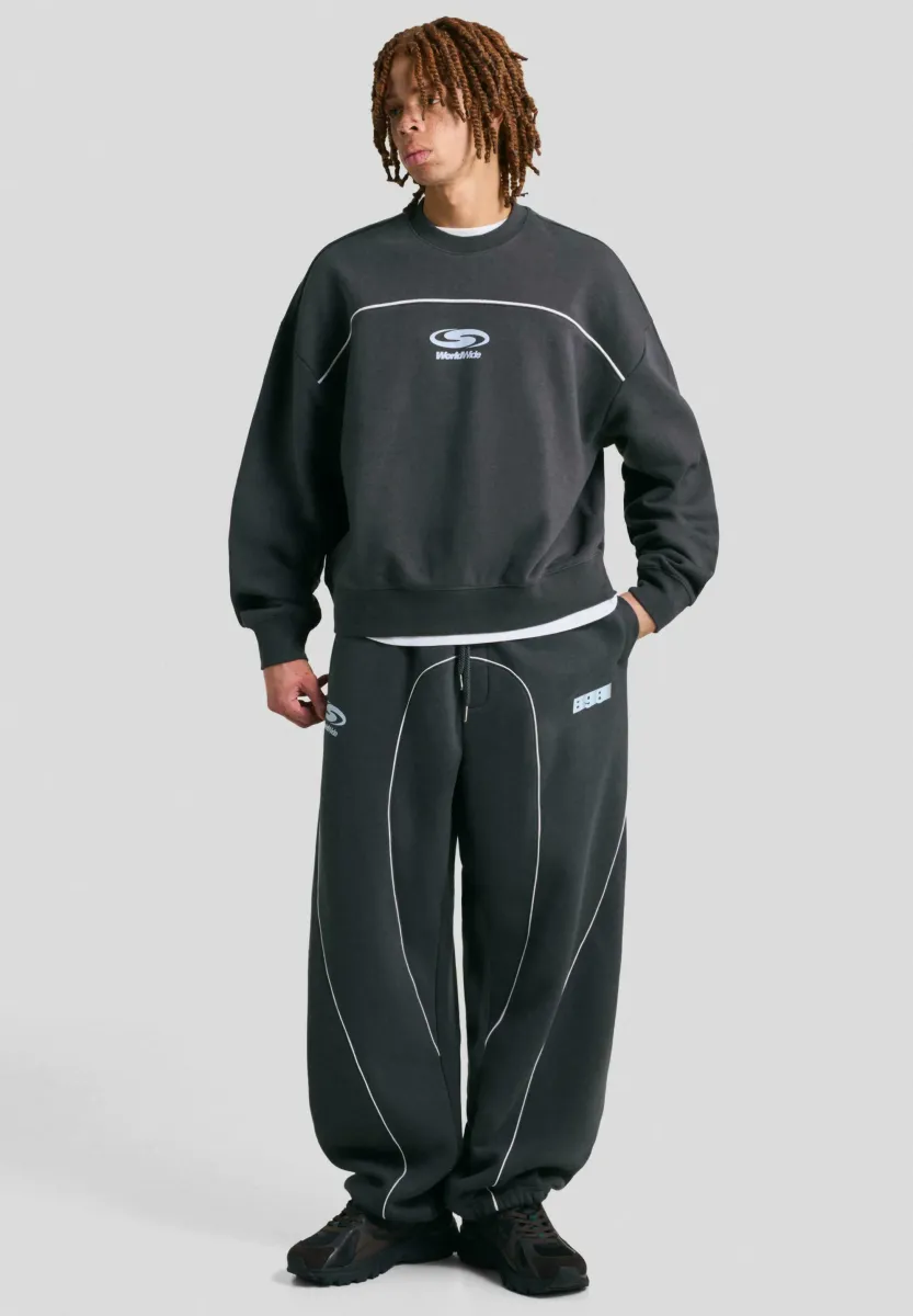 BALLOON FIT PRINTED - Jogginghose - mottled dark green