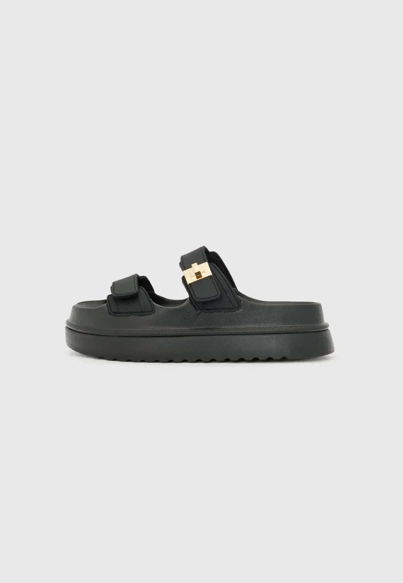 BIGSCHMONA - Pantolette flach - black