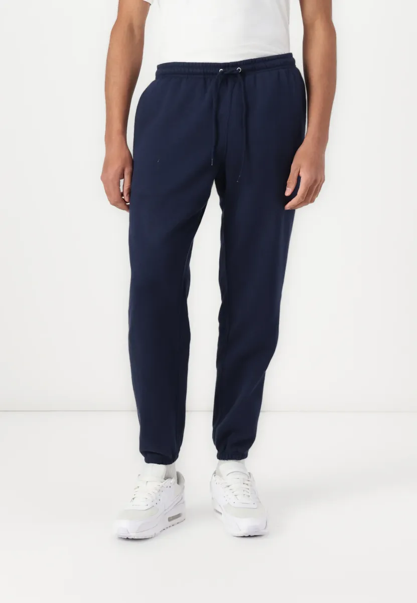 CLUB CUFF PANT - Jogginghose - obsidian/white