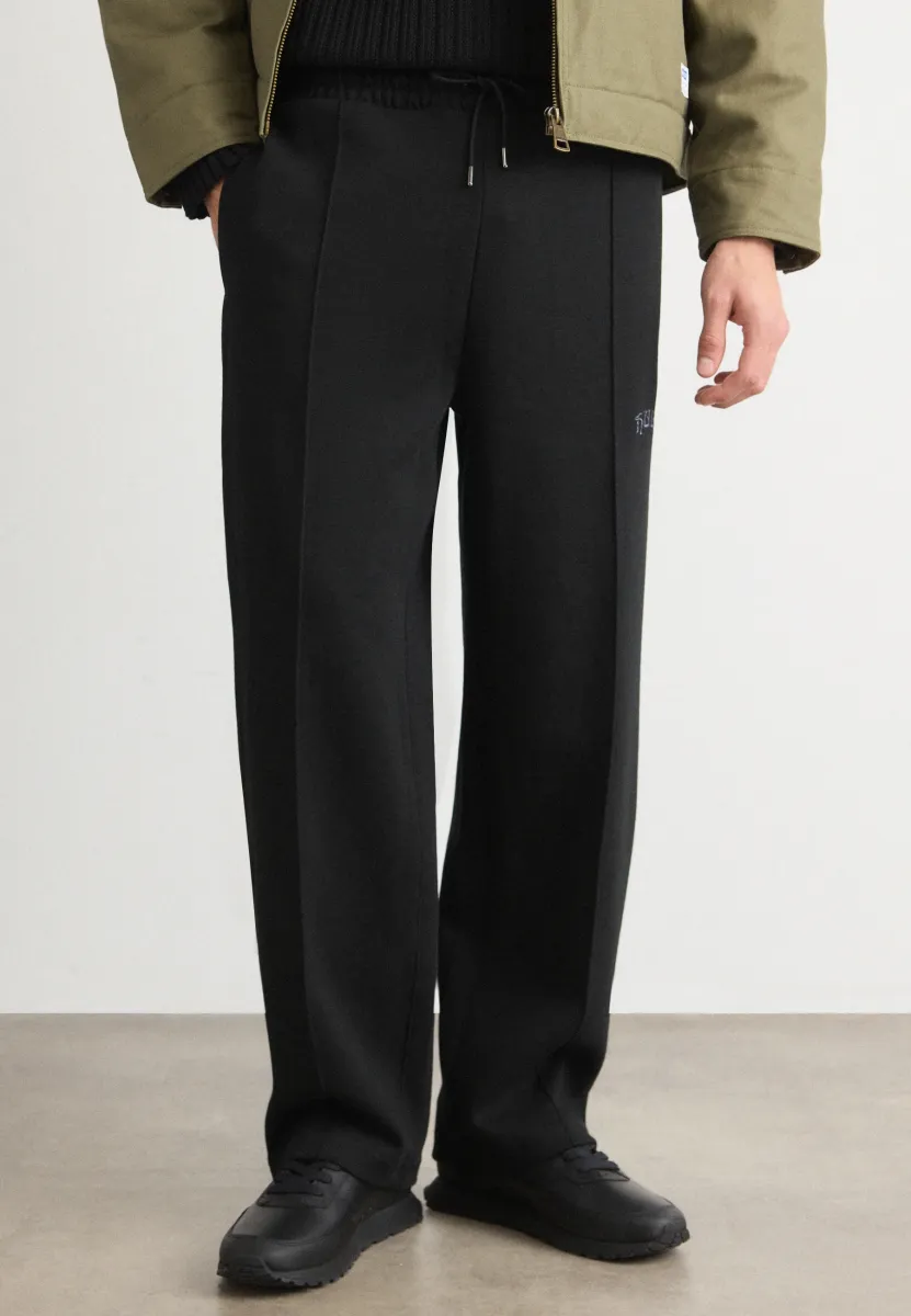 DADSINOLO - Jogginghose - black