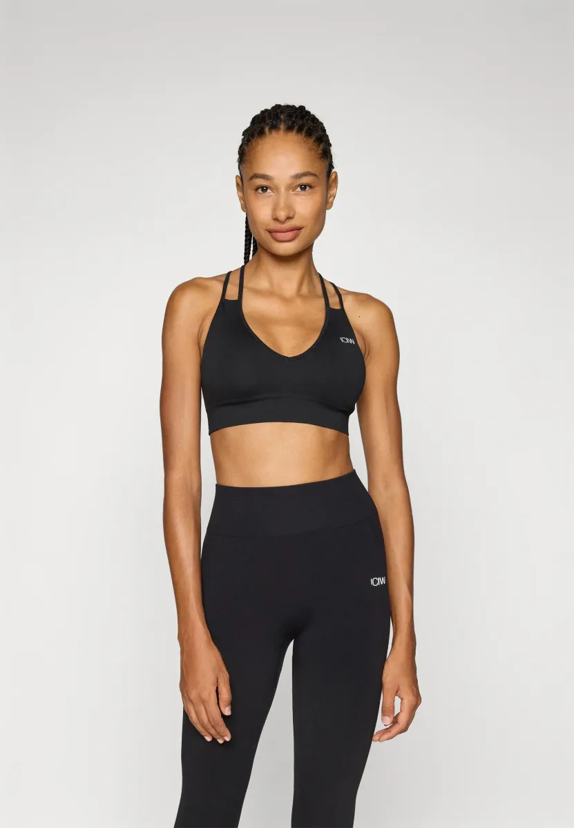 DEFINE SEAMLESS V SHAPE BRA - Sport-BH mit mittlerer Stützkraft - black