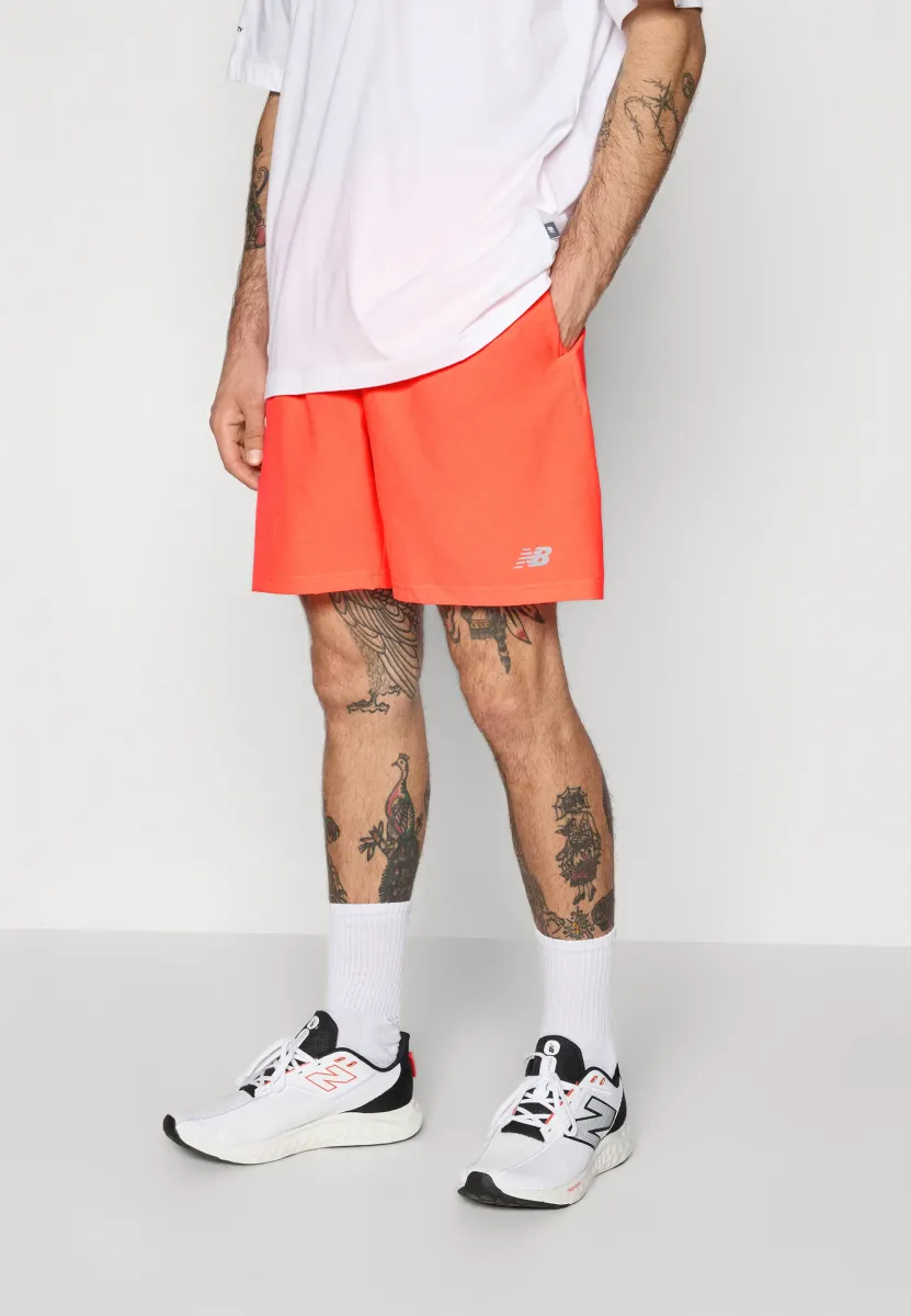 ESSENTIALS  - Kurze Sporthose - urgent red