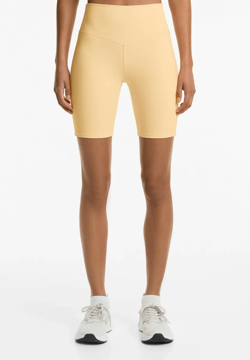 EVERMOVE 20CM BIKER - Tights - yellow