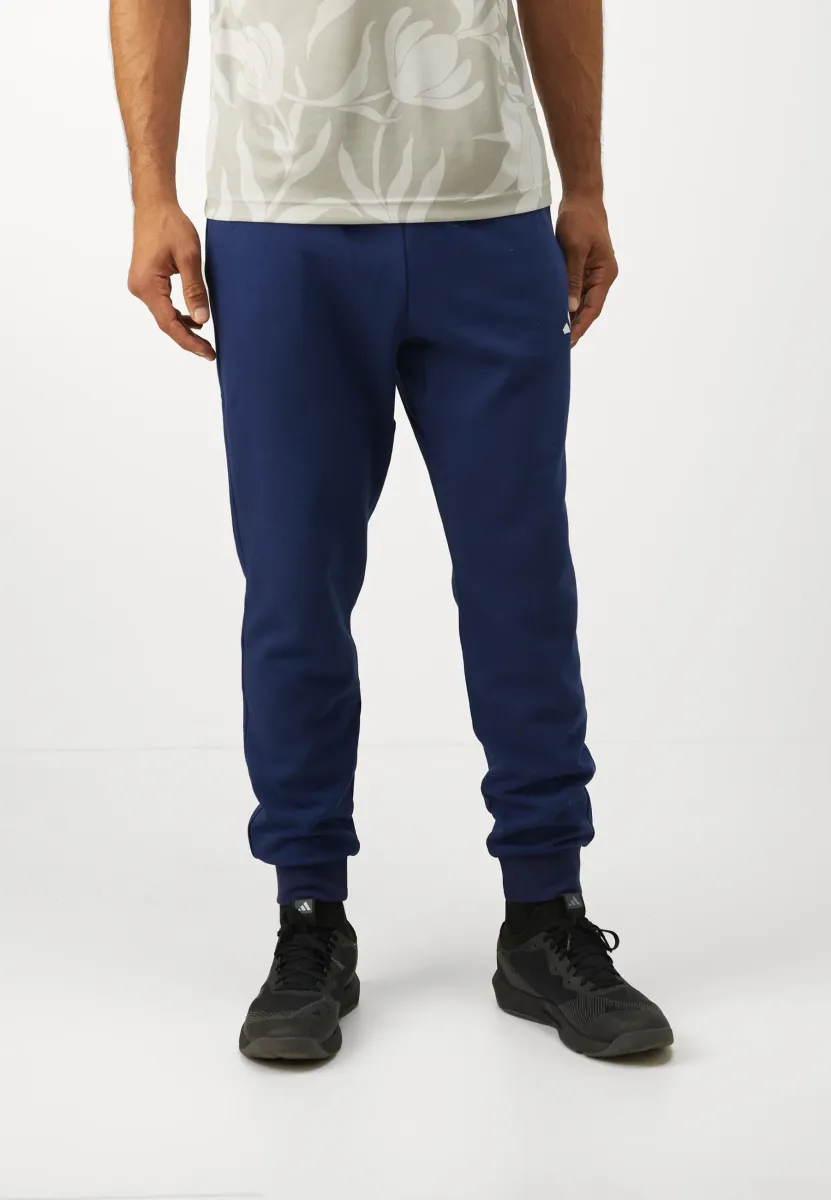 FEELCOZY - Jogginghose - dark blue/white