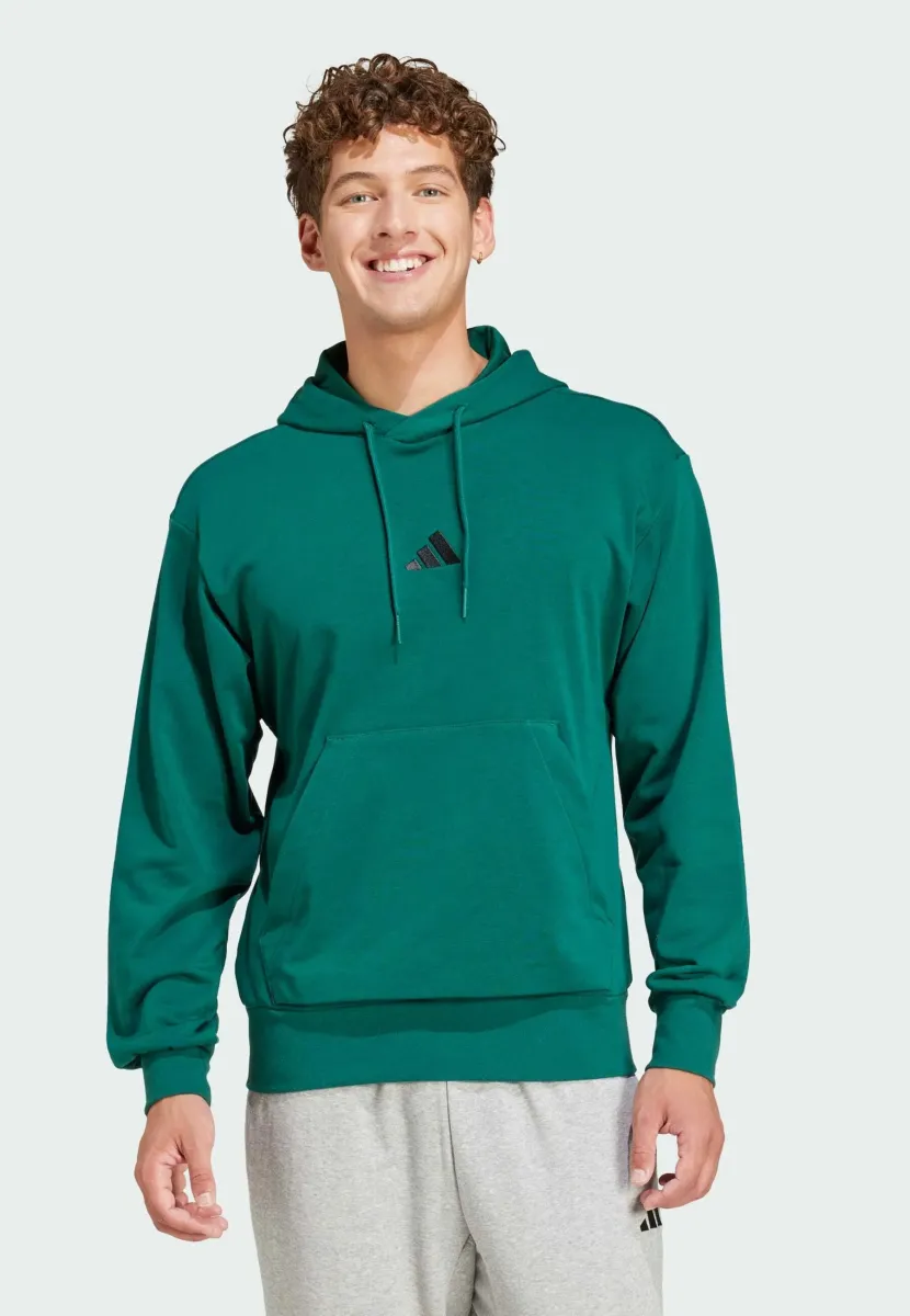 FEELCOZY - Kapuzenpullover - collegiate green black