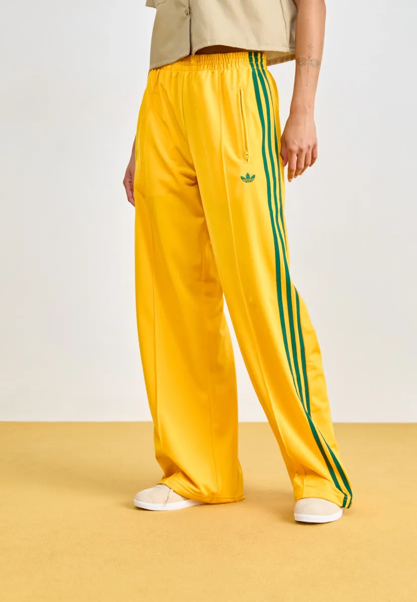 FIREBIRD - Jogginghose - crew yellow/collegiate green