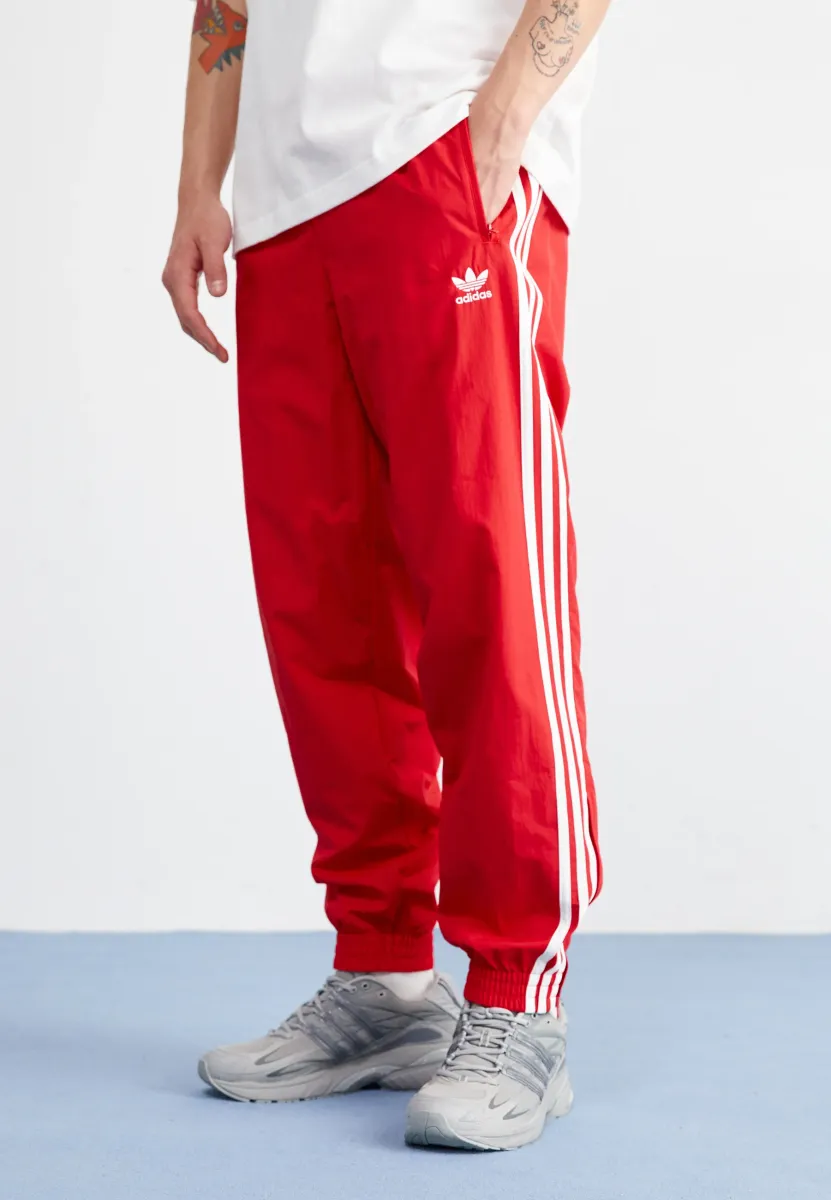 FIREBIRD PANTS - Jogginghose - better scarlet