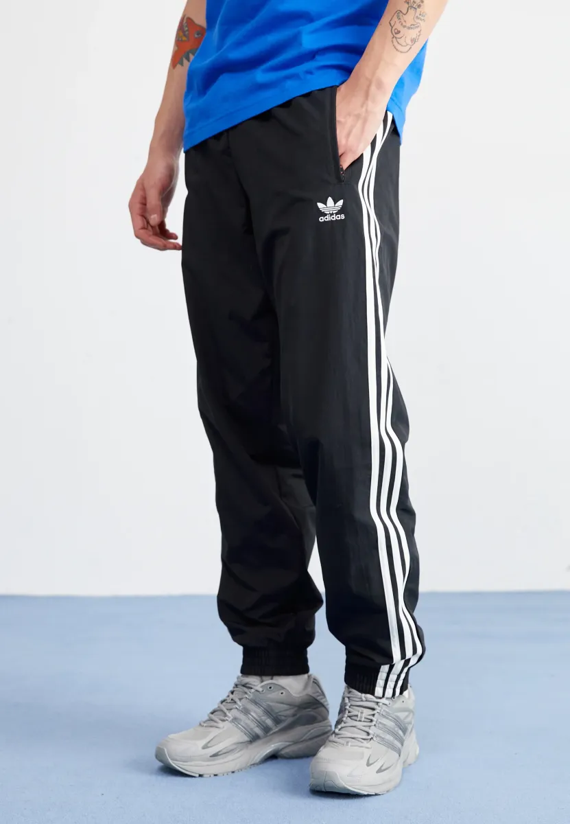 FIREBIRD PANTS - Jogginghose - black