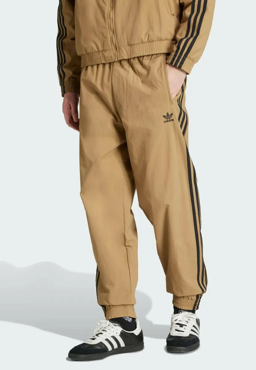FIREBIRD PANTS - Jogginghose - cardboard black