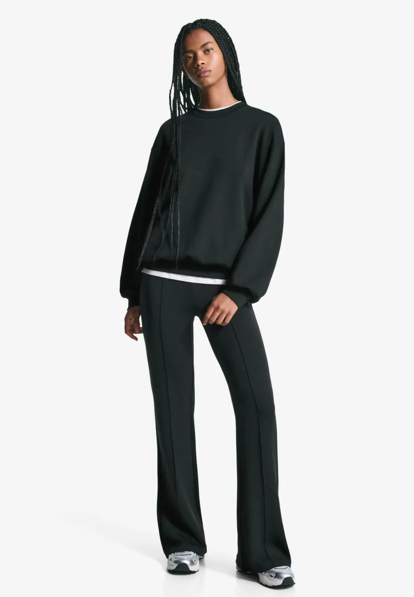 FLARED - Jogginghose - black