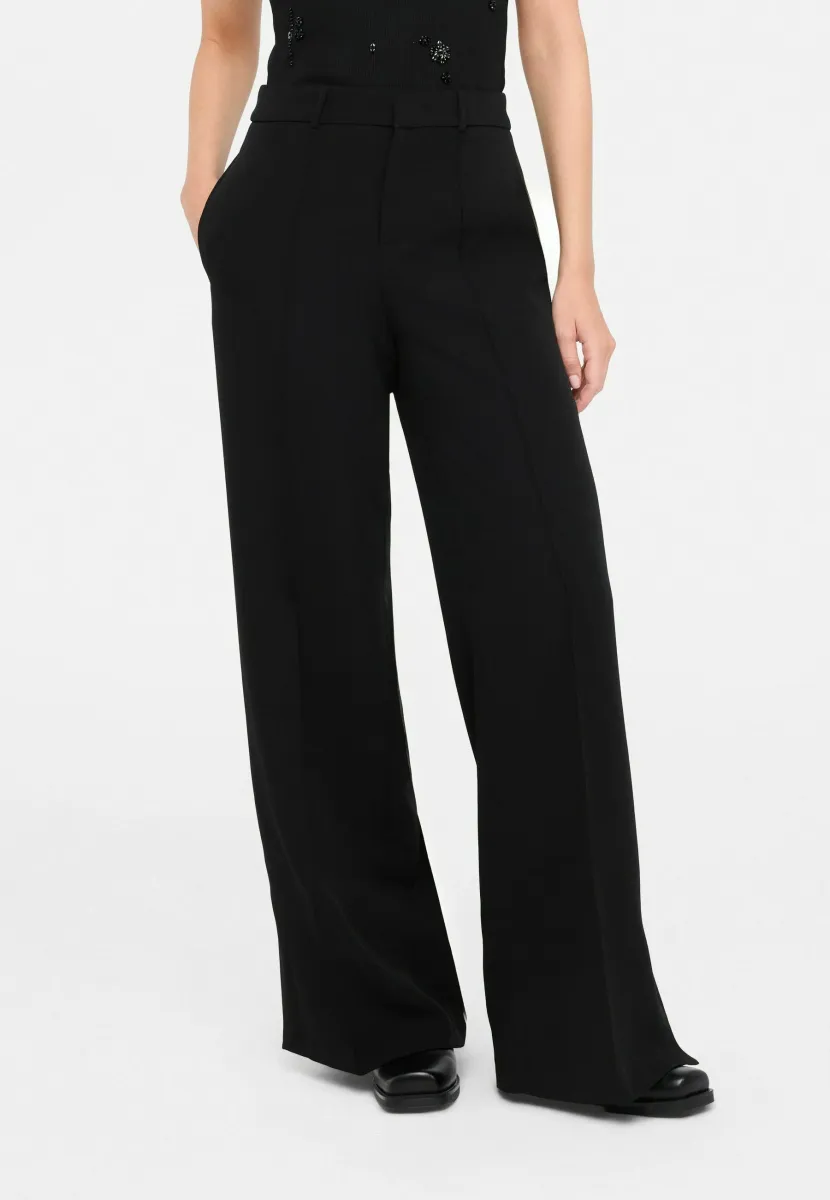 FLARED WITH SLITS - Stoffhose - black