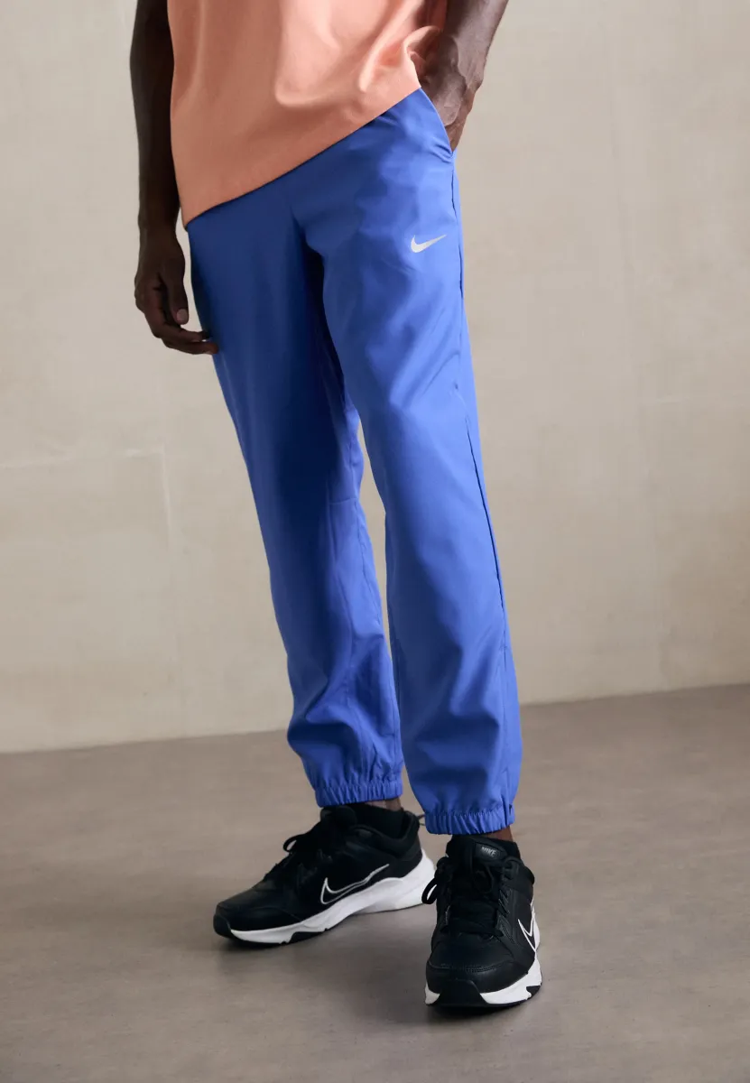FORM PANT - Jogginghose - comet blue/black