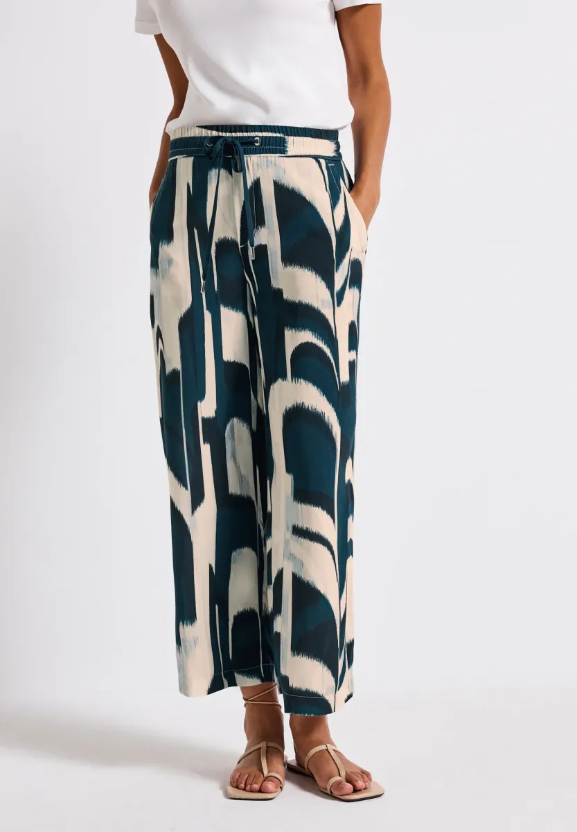 GEMUSTERTE WIDE - Stoffhose - türkis