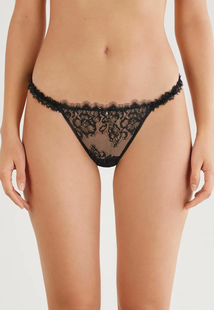 GLIMMER OF PLEASURE - String - black