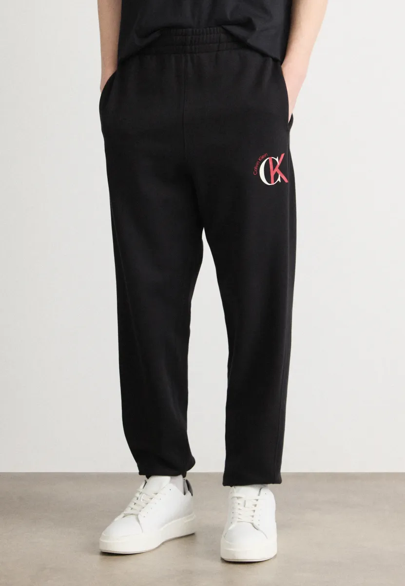 GRAPHIC - Jogginghose - black