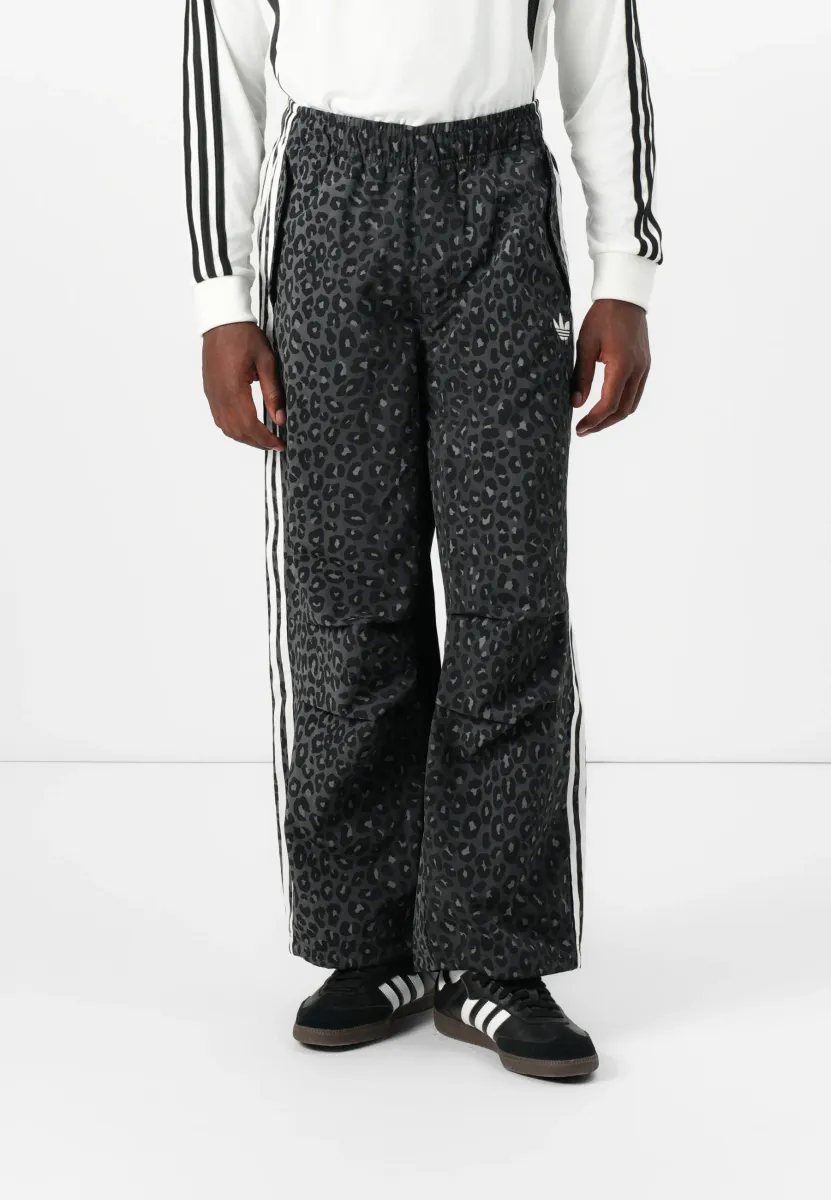 GRAPHIC UNISEX - Jogginghose - black