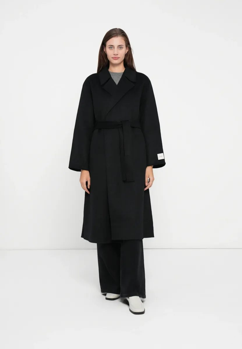 HERO FACE - Trenchcoat - black