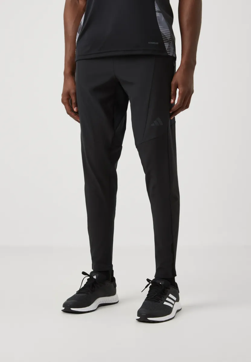 HYBRID PANT - Jogginghose - black
