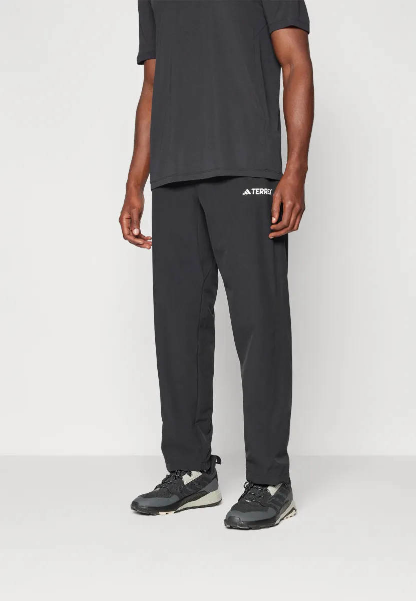 LITEFLEX - Stoffhose - black