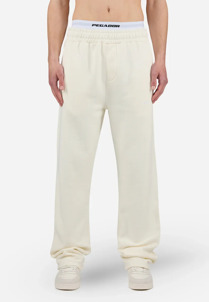 LOGO WIDE PANTS - Jogginghose - washed unbleached white gum