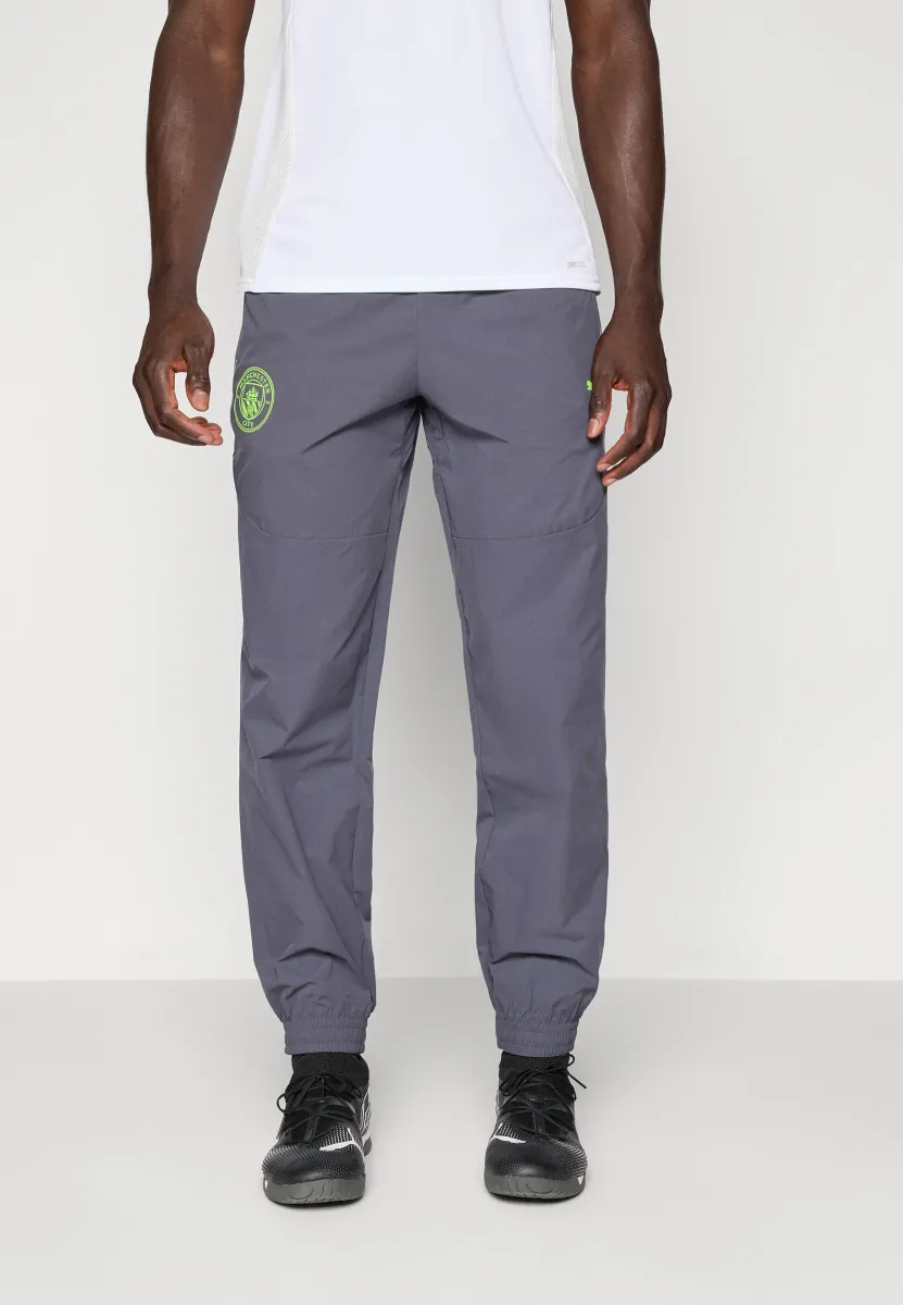 MCFC PUMATECH PANTS - Vereinsmannschaften - galactic gray/pro green