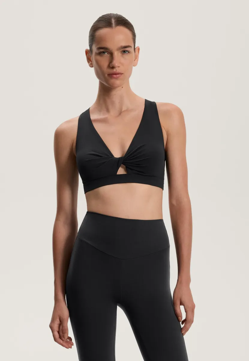 MEDIUM-SUPPORT TWIST COMFORTLUX WITH CUPS - Sport-BH mit mittlerer Stützkraft - black