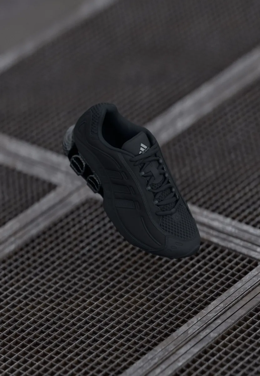 MEGARIDE O1 UNISEX - Sneaker low - core black/iron metallic