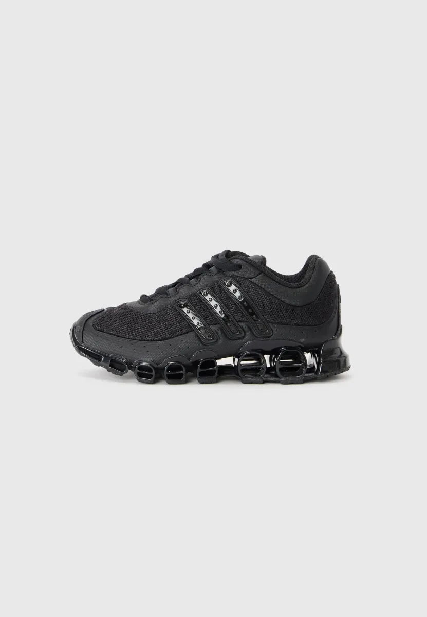 MEGARIDE UNISEX - Sneaker low - core black/carbon