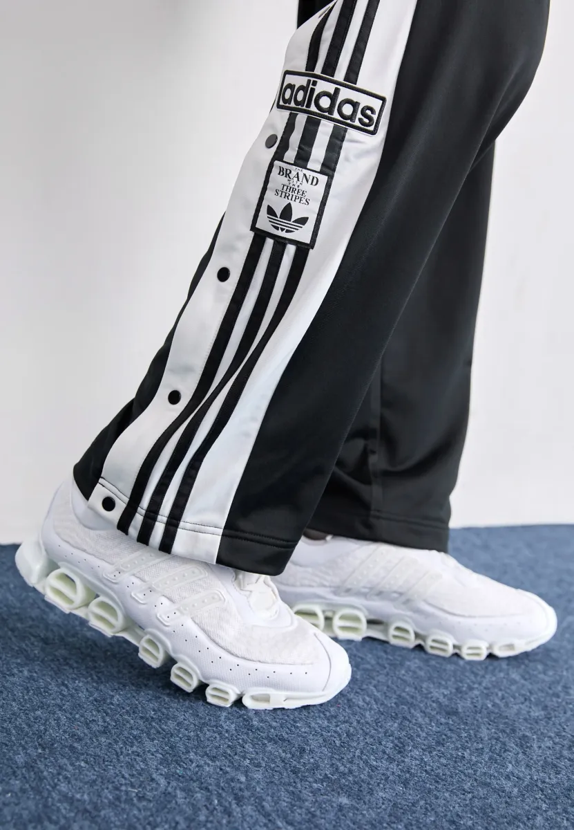 MEGARIDE UNISEX - Sneaker low - footwear white/grey one