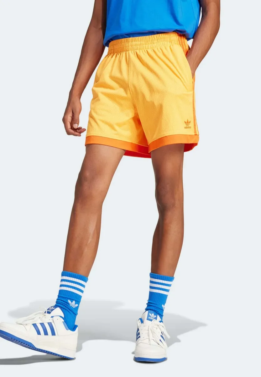 MOCK EYELET - Jogginghose - real gold