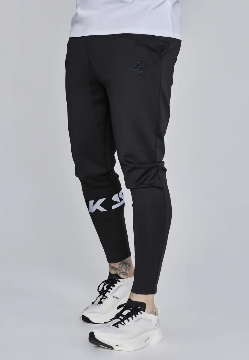 MUSCLE FIT JOGGERS - Jogginghose - black