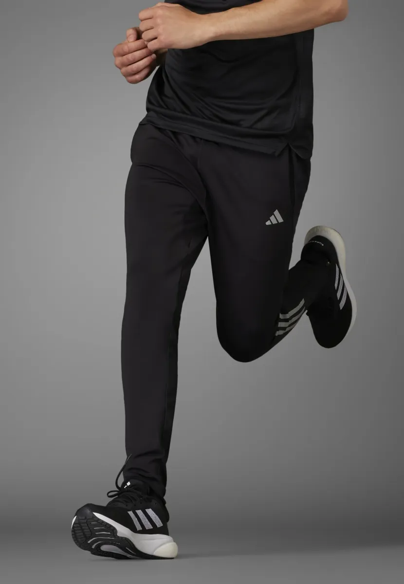 OWN THE RUN ASTRO SEAMLESS KNIT - Jogginghose - black