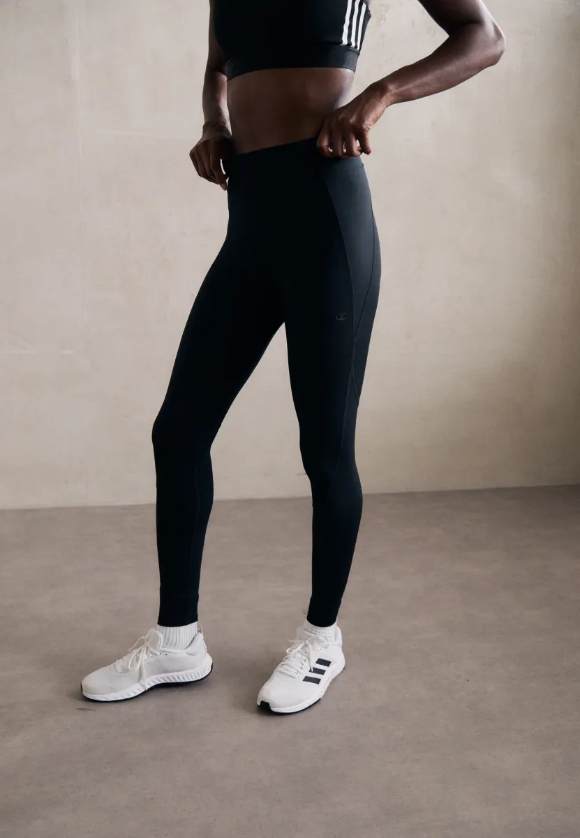 PERFORMANCE LEGGINGS - Tights - black