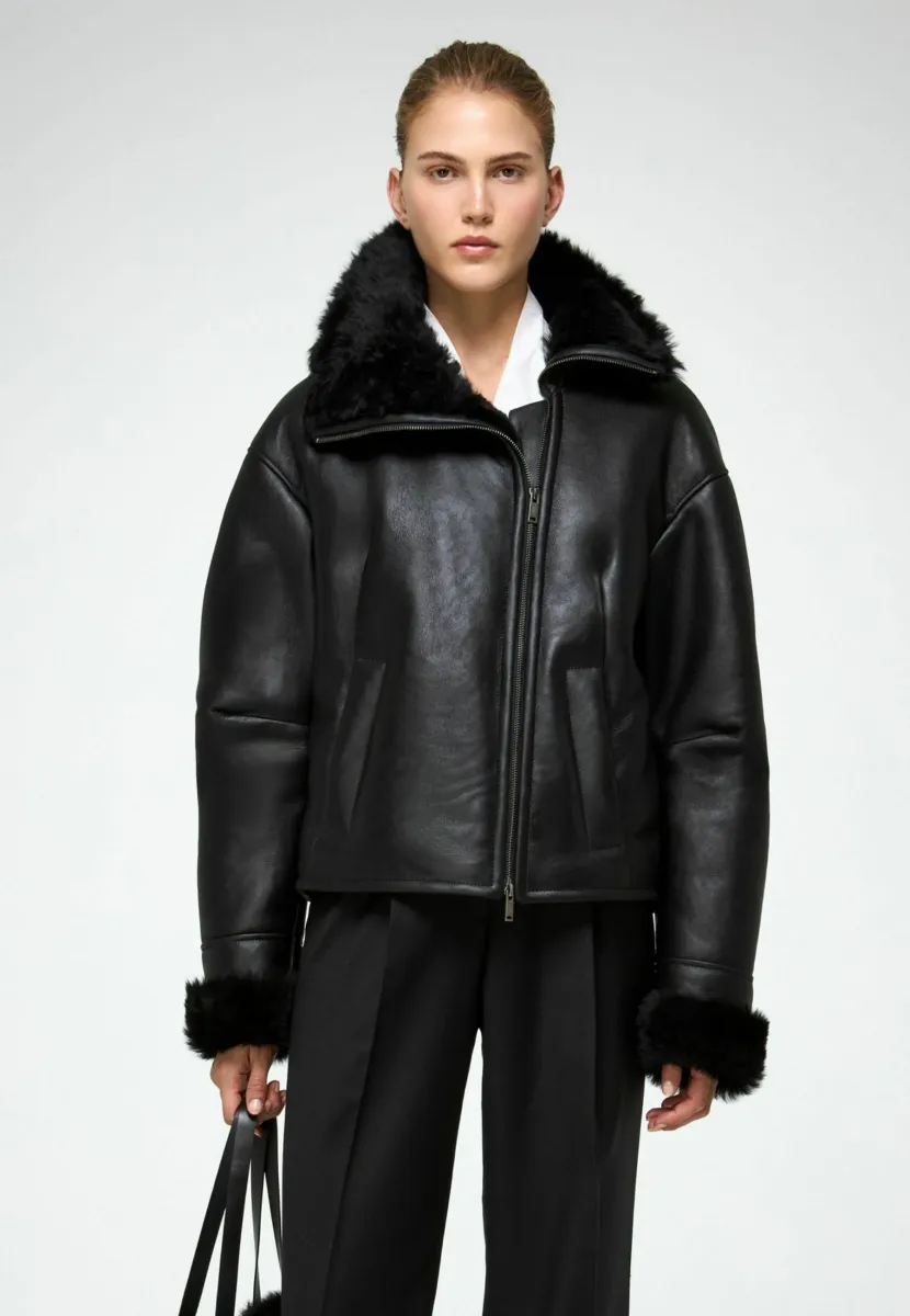 PIA - Winterjacke - black