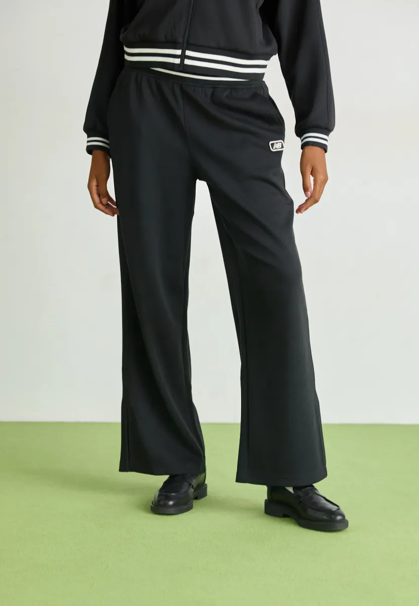POST SEASON TRACK PANT - Jogginghose - black