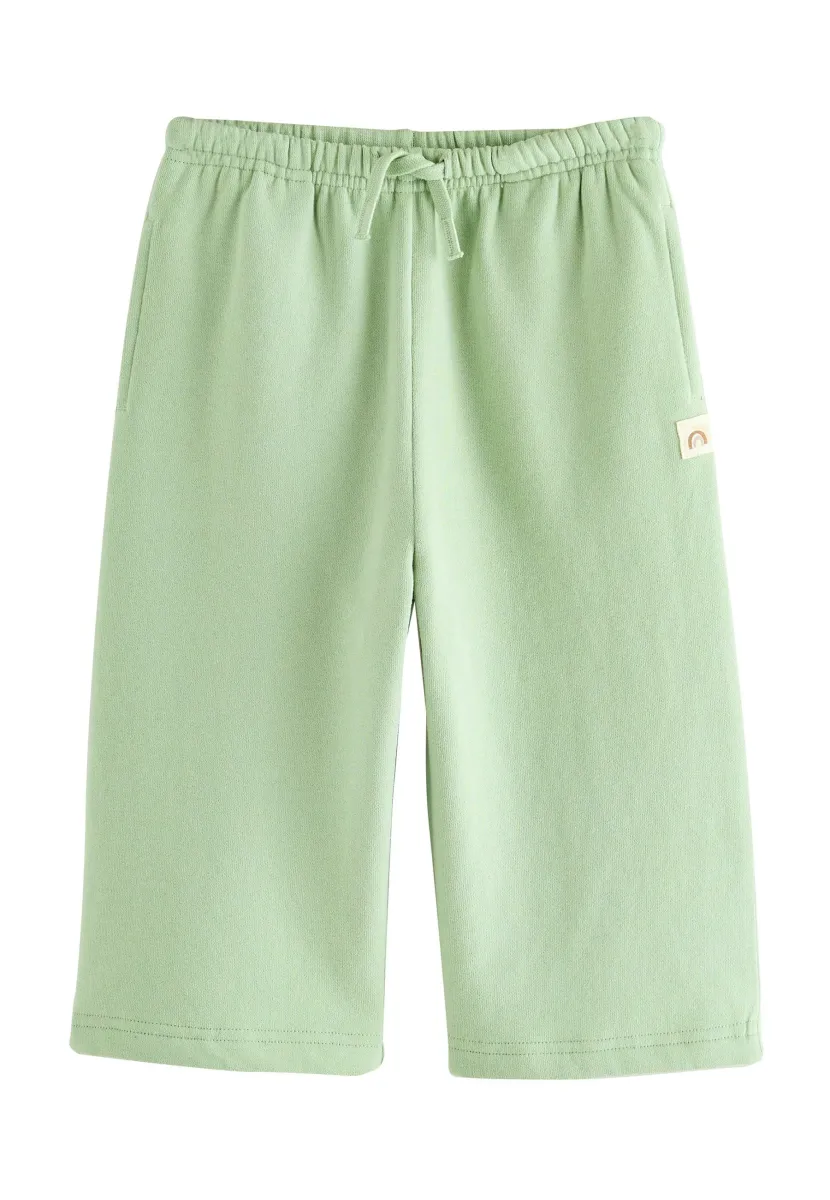 REGULAR FIT - WIDE LEG - Jogginghose - sage green