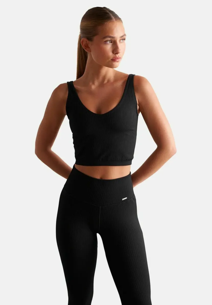 RIBBED SEAMLESS BRALETTE - Sport-BH mit leichter Stützkraft - black