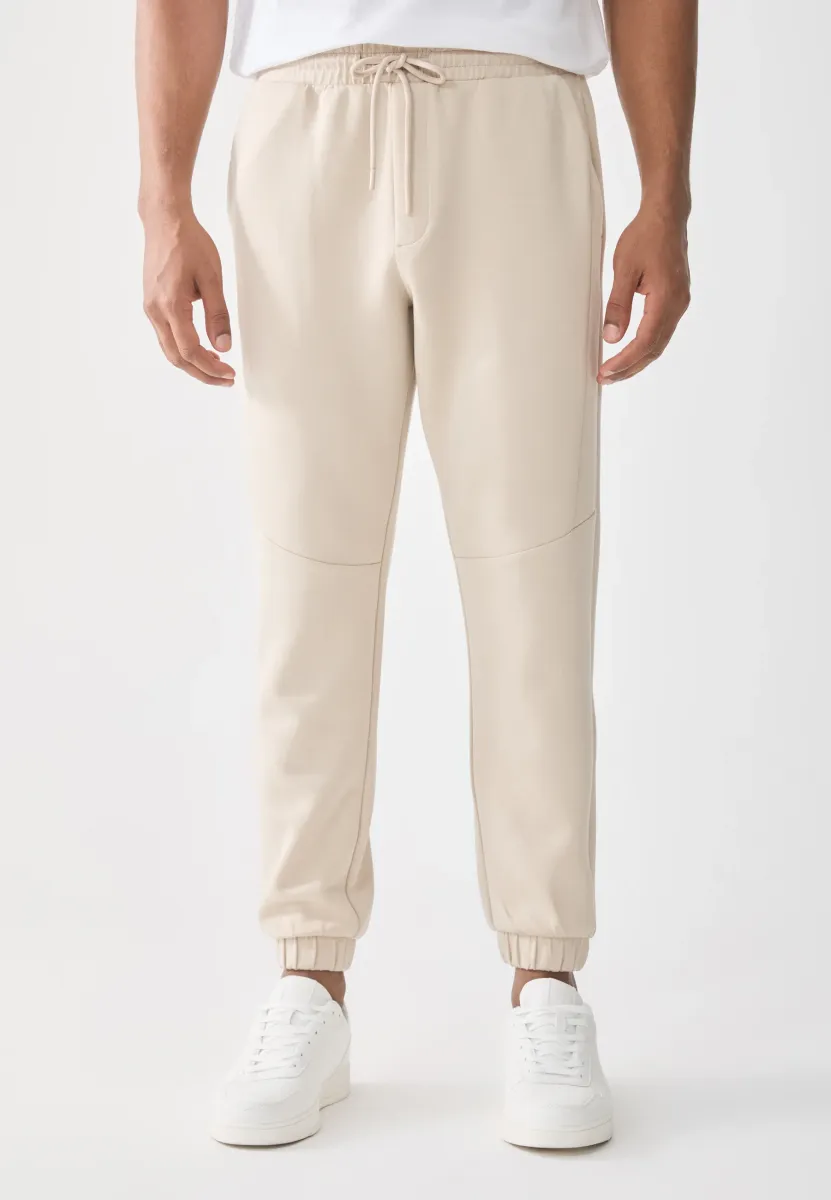 SCUBA JOGGER - Jogginghose - beige