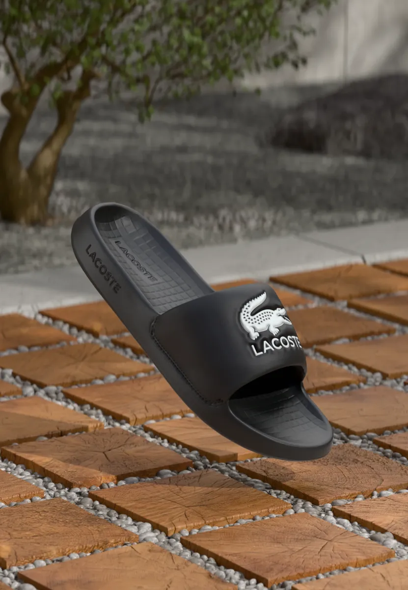 SERVE SLIDE 1.0 - Pantolette flach - black/white