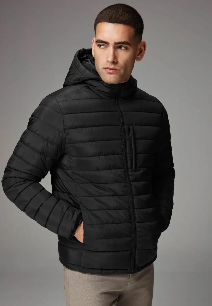 SHOWER RESISTANT WEIGHT REGULAR FIT - Winterjacke - black
