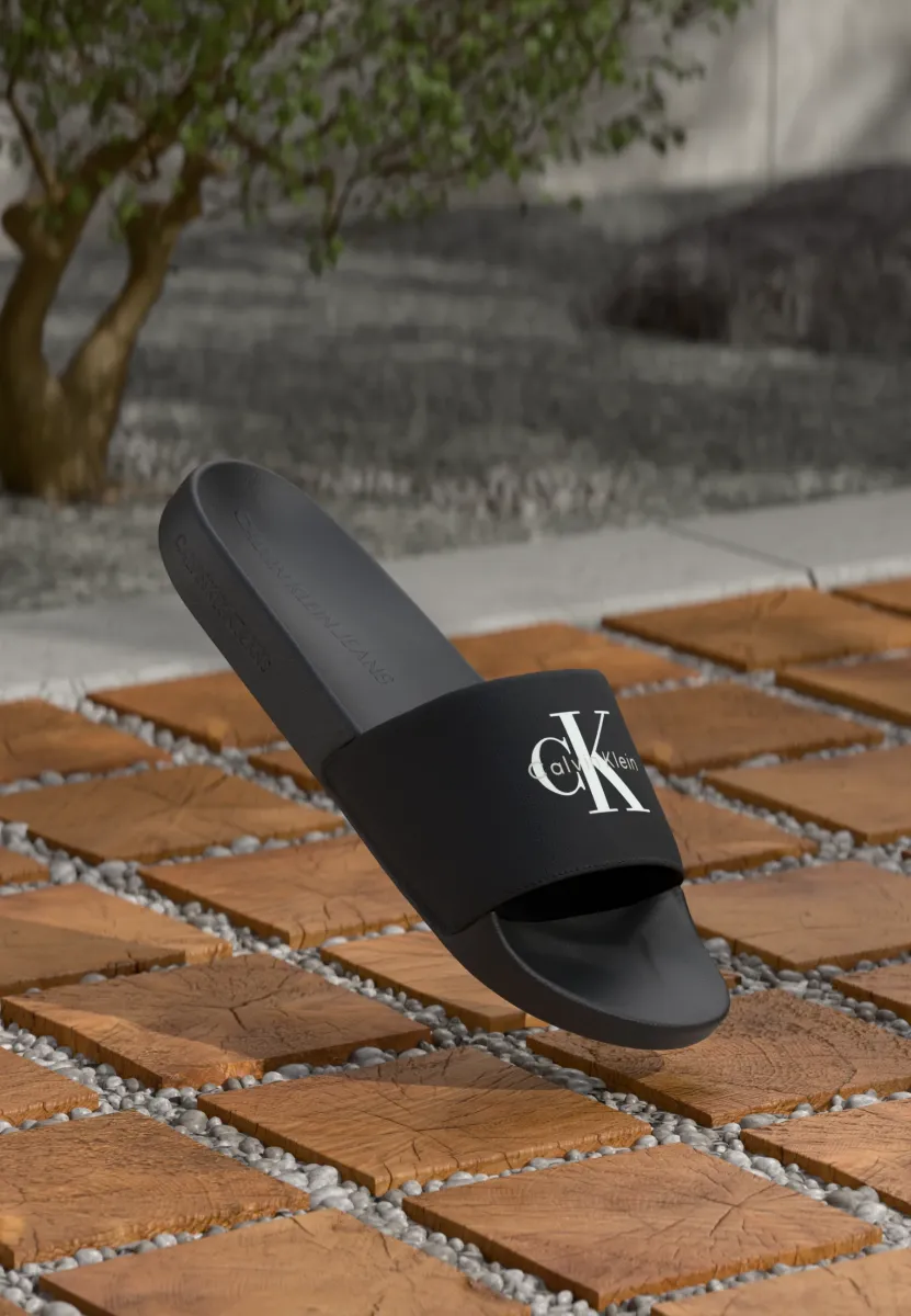SLIDE MONOLOGO - Pantolette flach - triple black
