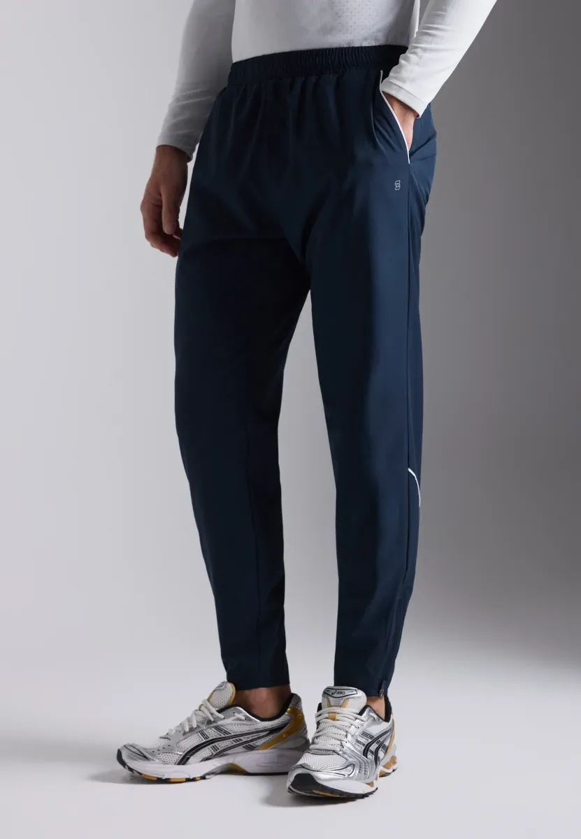 SLIM FIT TRACKSUIT BOTTOMS WITH POCKETS & ANKLE ZIP - Jogginghose - dark blue