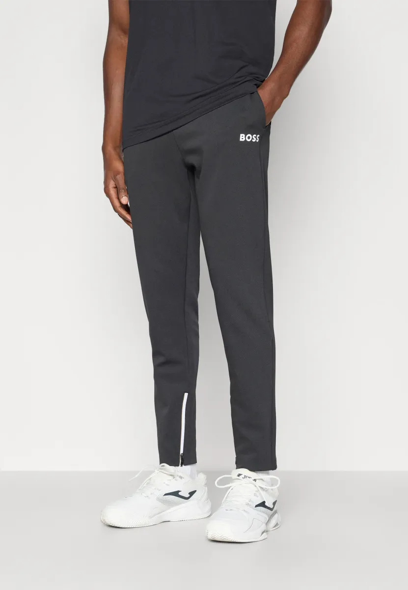 SPIN LONG - Jogginghose - black