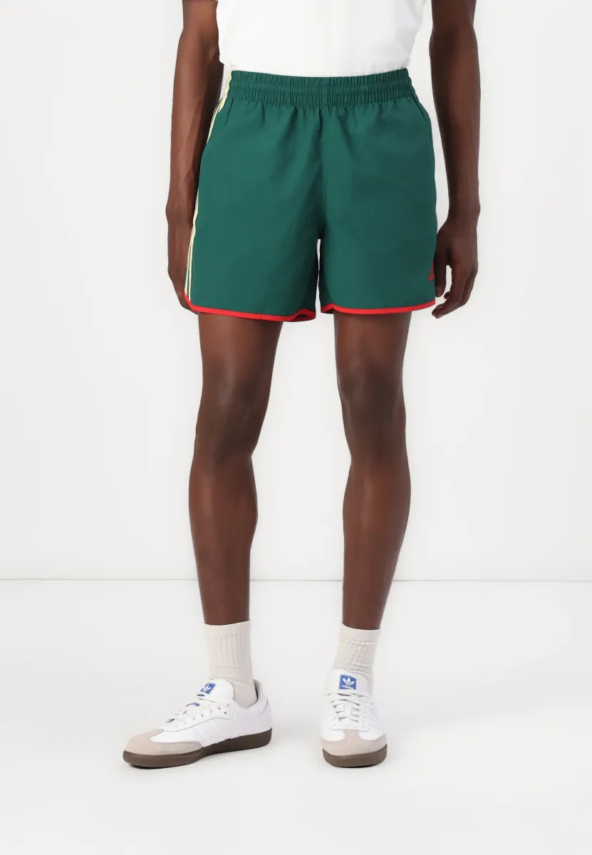 SPRINTER - Shorts - collegiate green/powder yellow