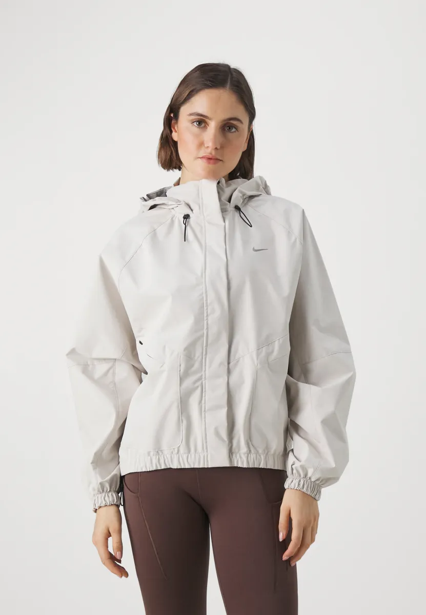 STORM-FIT SWIFT - Laufjacke - light orewood brown black