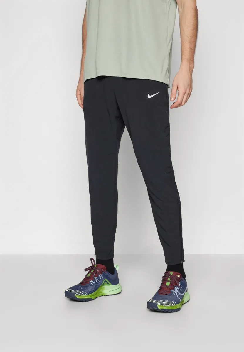 STRIDE - Jogginghose - black/reflective silver